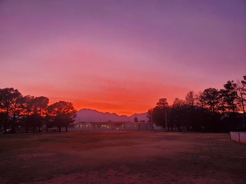 The NECA field at sunset with the Franklin Mountains in the distance.